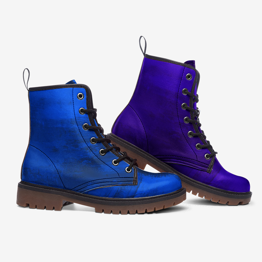 a pair of blue and purple boots on a white background