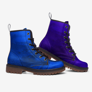 a pair of blue and purple boots on a white background