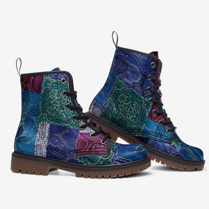 a pair of blue boots with colorful flowers on them
