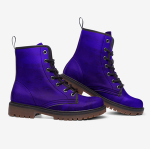 a pair of purple boots on a white background