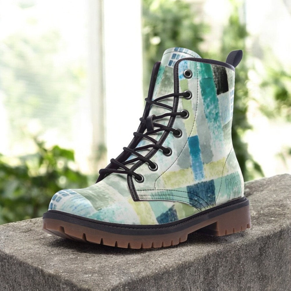 a close up of a pair of boots on a ledge