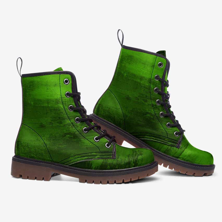 a pair of green boots with black laces