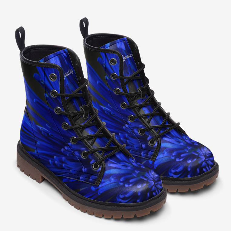 a pair of blue boots with black laces