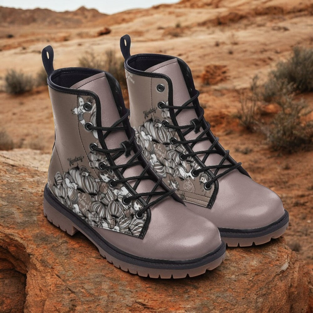 a pair of boots with a picture of a cat on them