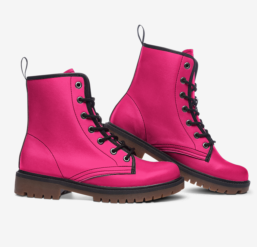 a pair of pink boots with black laces