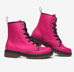 a pair of pink boots with black laces