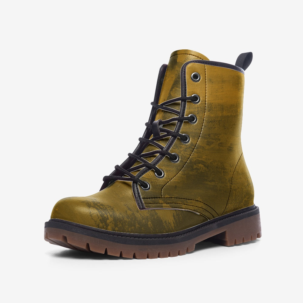 a pair of yellow boots with black laces