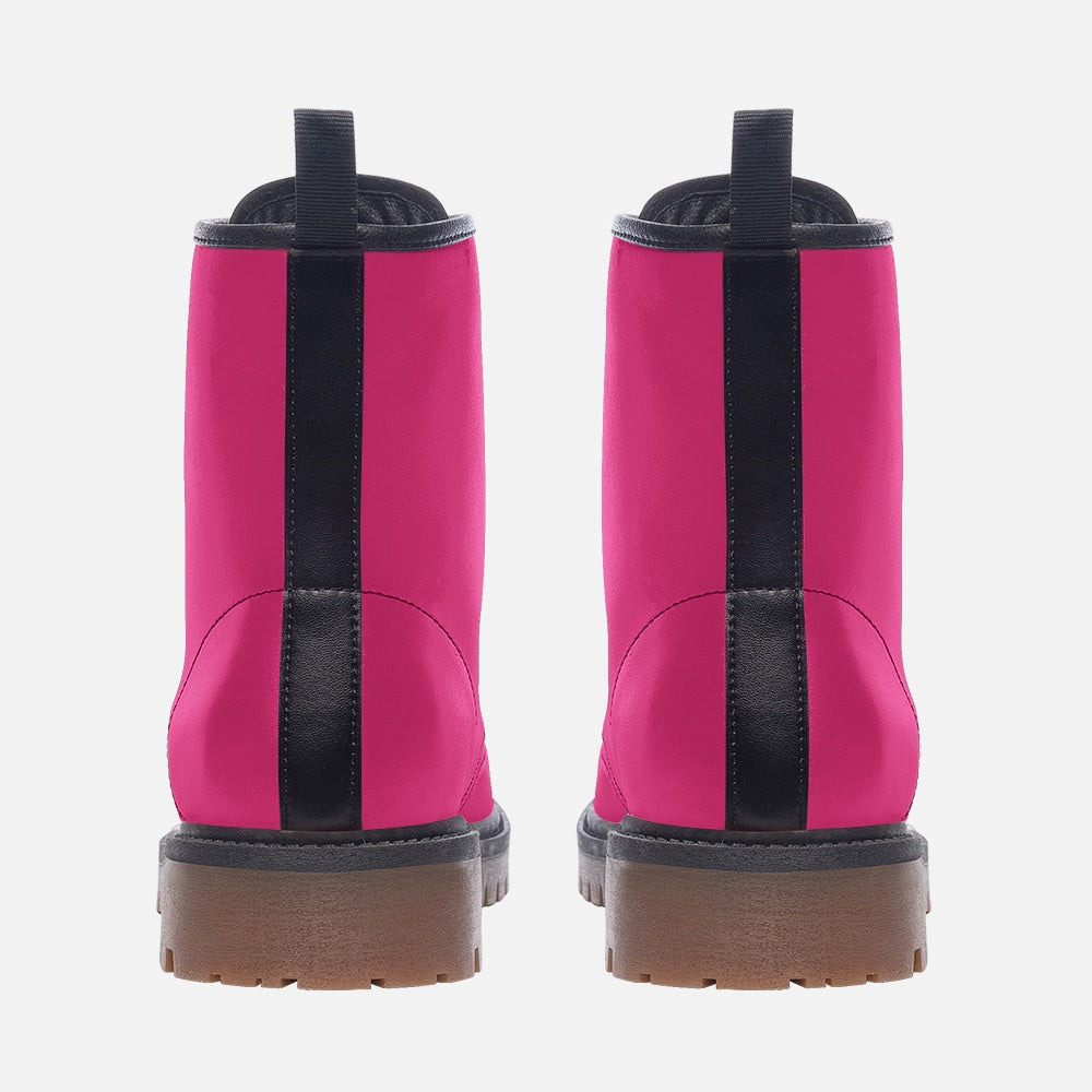 a pair of pink boots with a brown sole