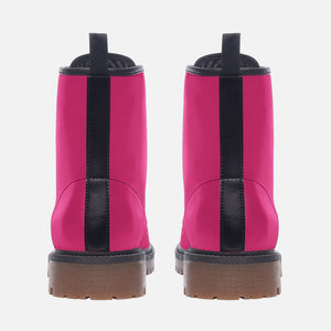 a pair of pink boots with a brown sole