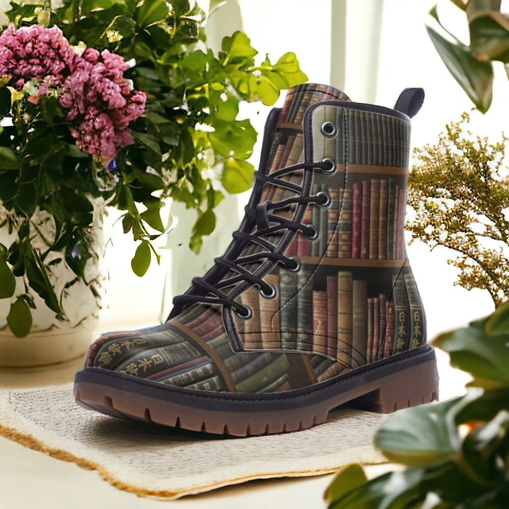 a pair of boots sitting on top of a table next to a potted plant