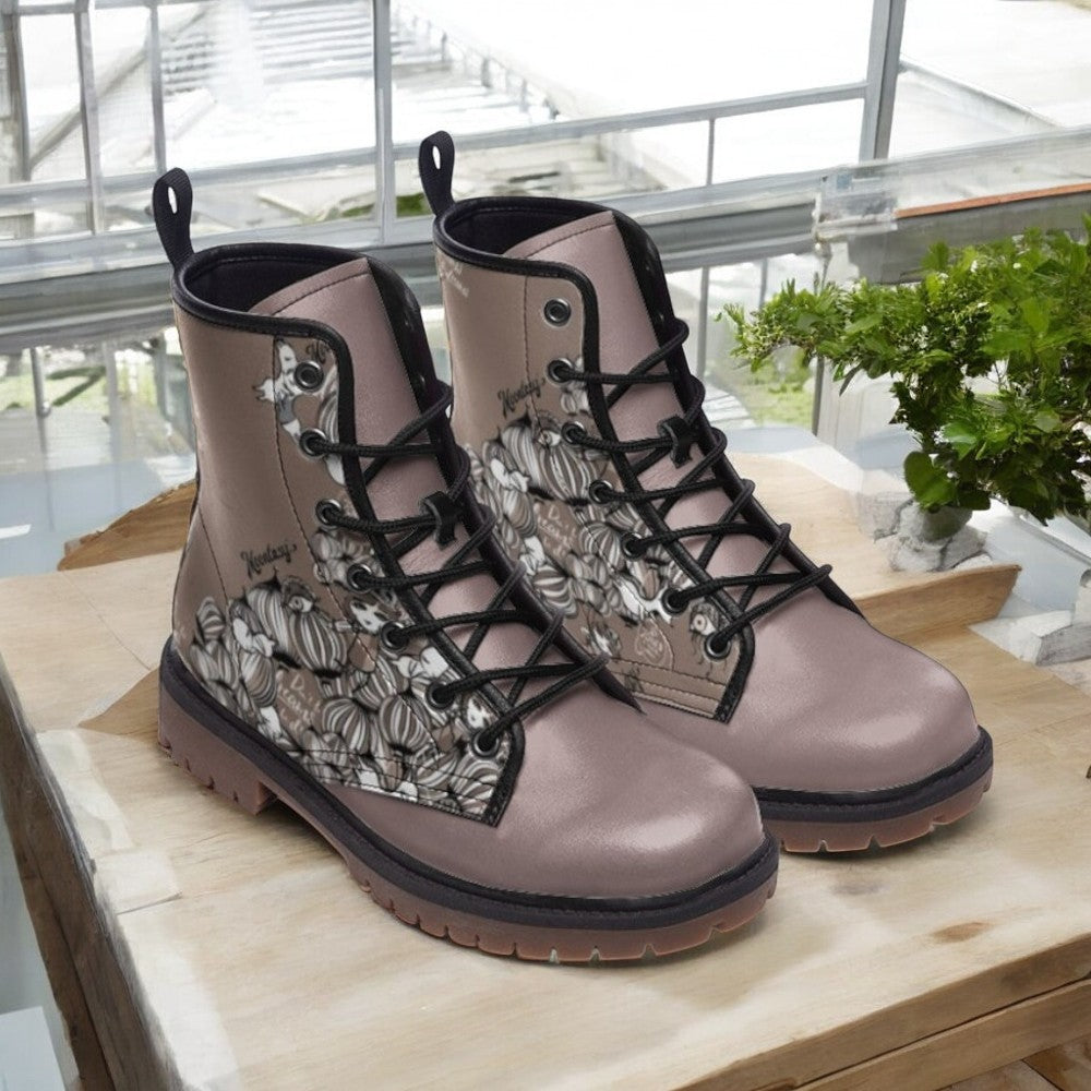 a pair of boots sitting on top of a wooden table