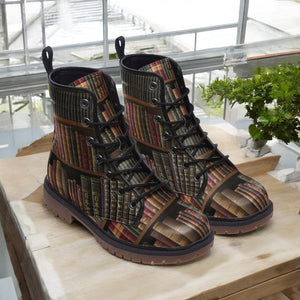 a pair of boots sitting on top of a wooden table