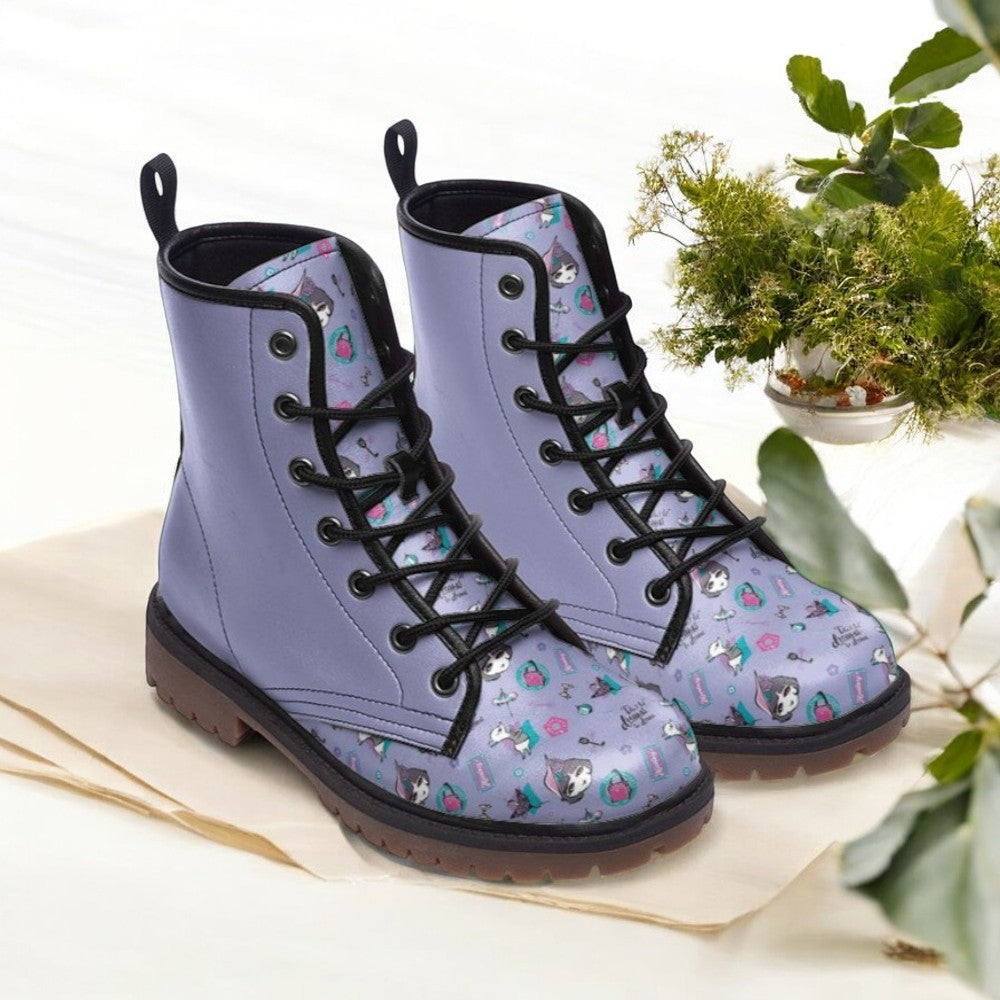 a pair of blue boots sitting on top of a table