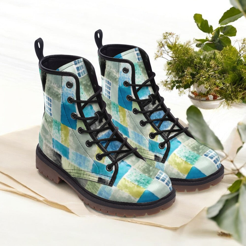 a pair of boots sitting on top of a table