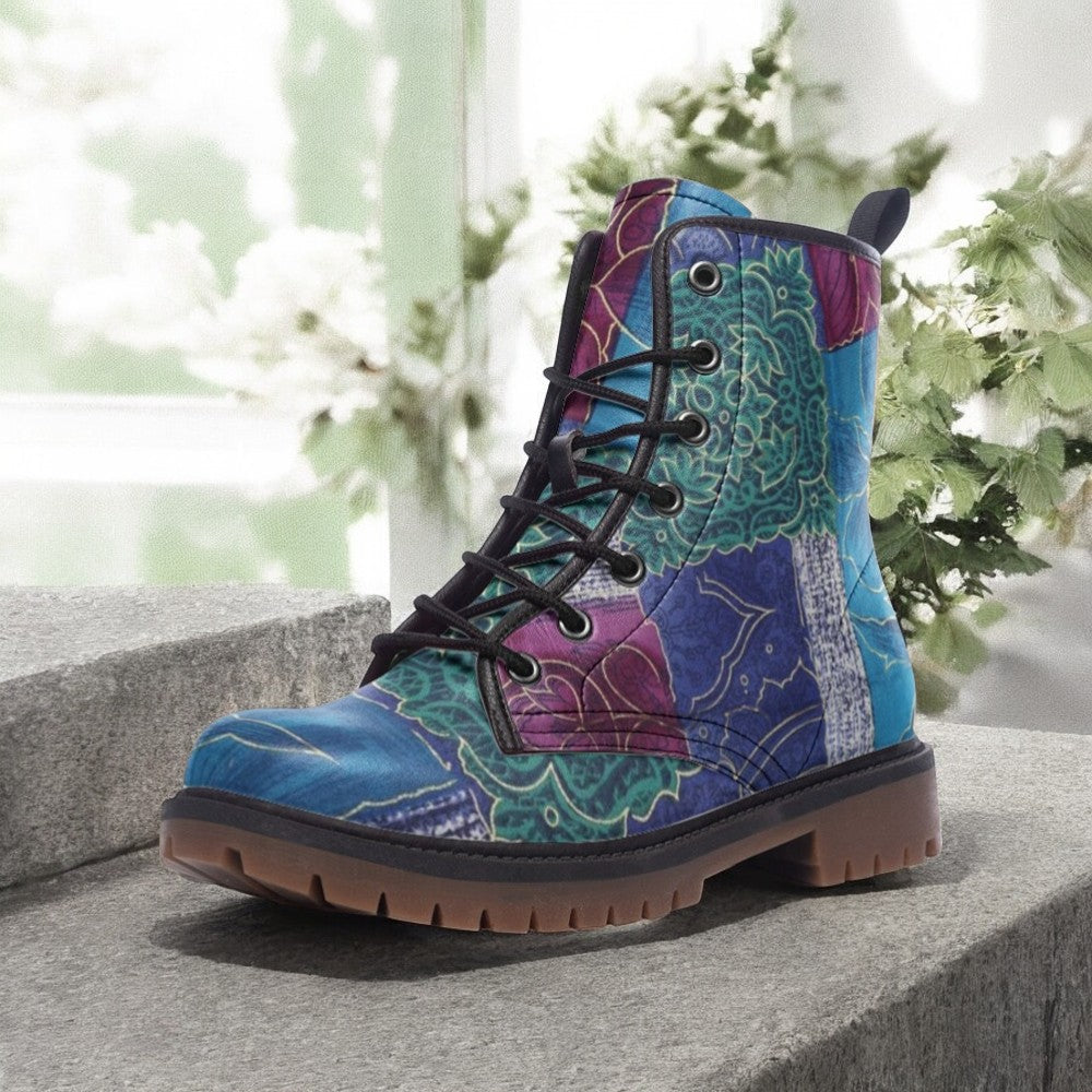 a pair of colorful boots sitting on a ledge