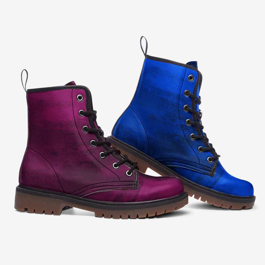 a pair of purple and blue boots on a white background