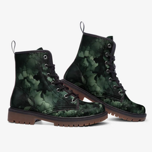A pair of green camouflage boots with a floral pattern.