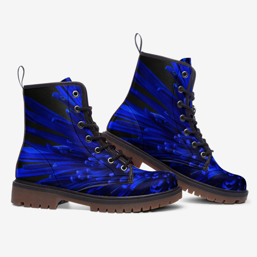 a pair of blue boots with black laces