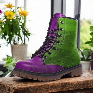 A purple and green boot is displayed on a wooden surface, with yellow flowers visible in the background.