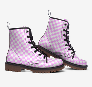 a pair of pink and white checkered boots