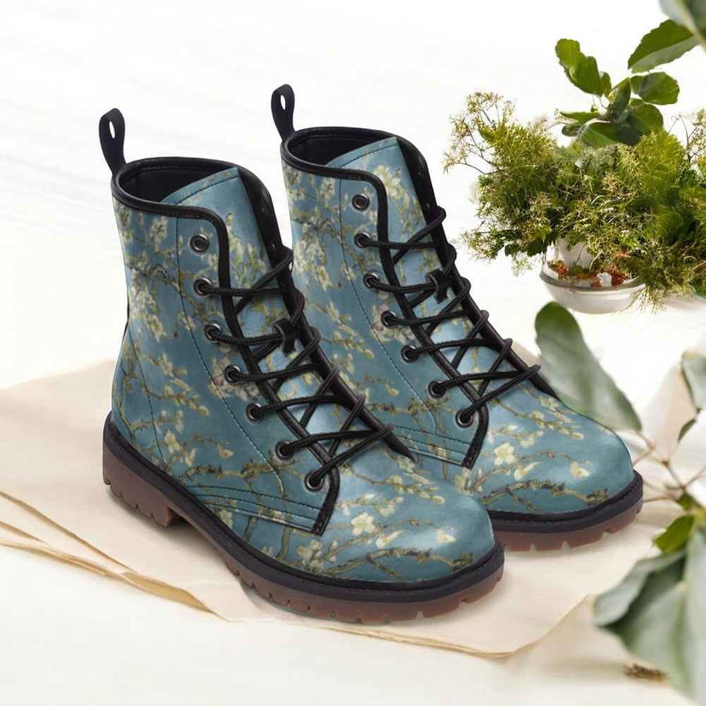 a pair of blue boots sitting on top of a table