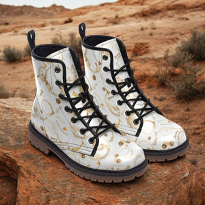 a pair of white boots sitting on top of a rock