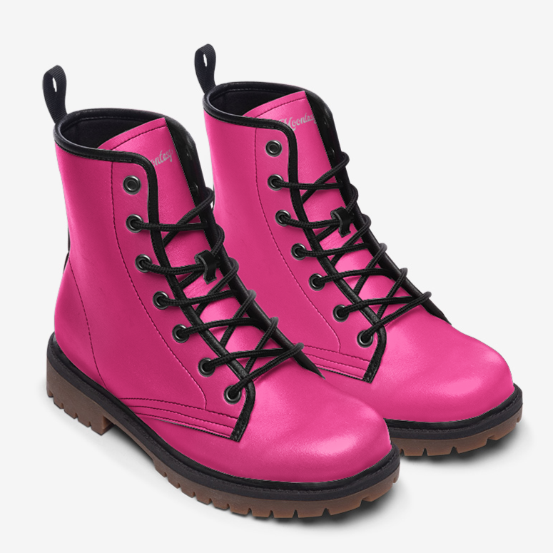 a pair of pink boots with black laces