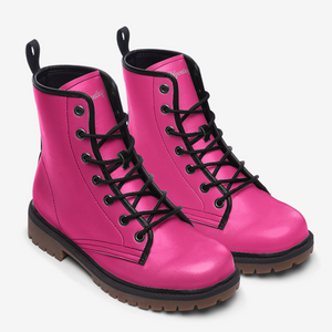 a pair of pink boots with black laces