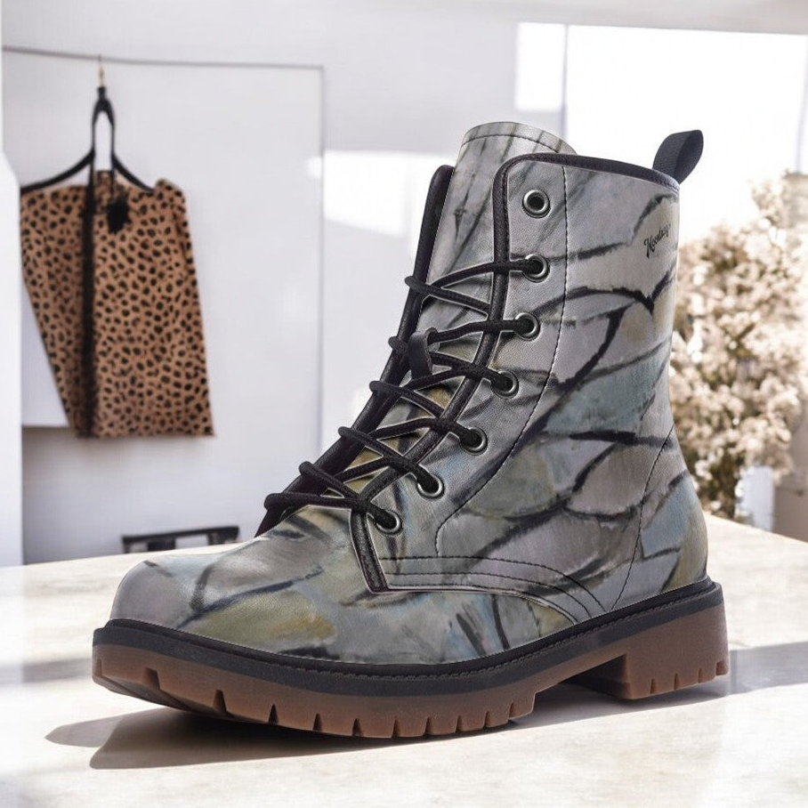 a pair of boots sitting on top of a counter