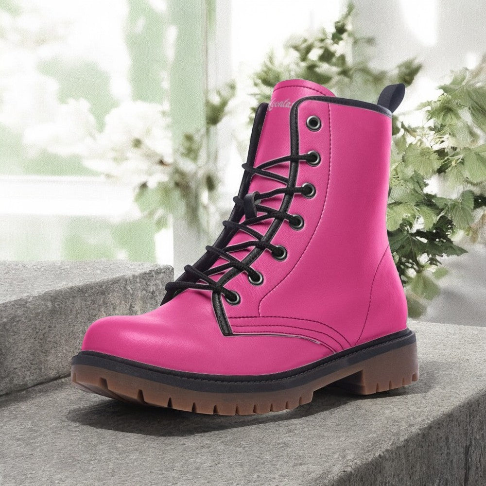 a close up of a pink boot on a ledge